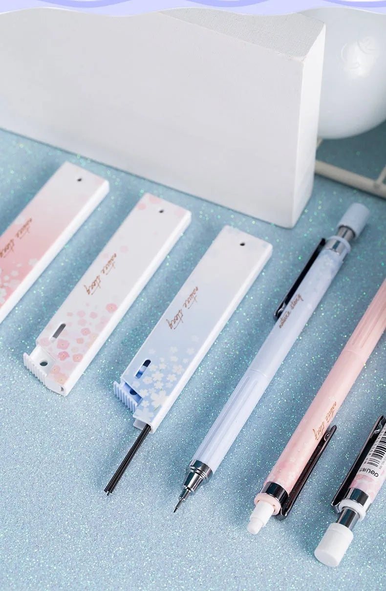 Set of three 0.5mm automatic cartoon pencils with HB lead refills in mixed colours.