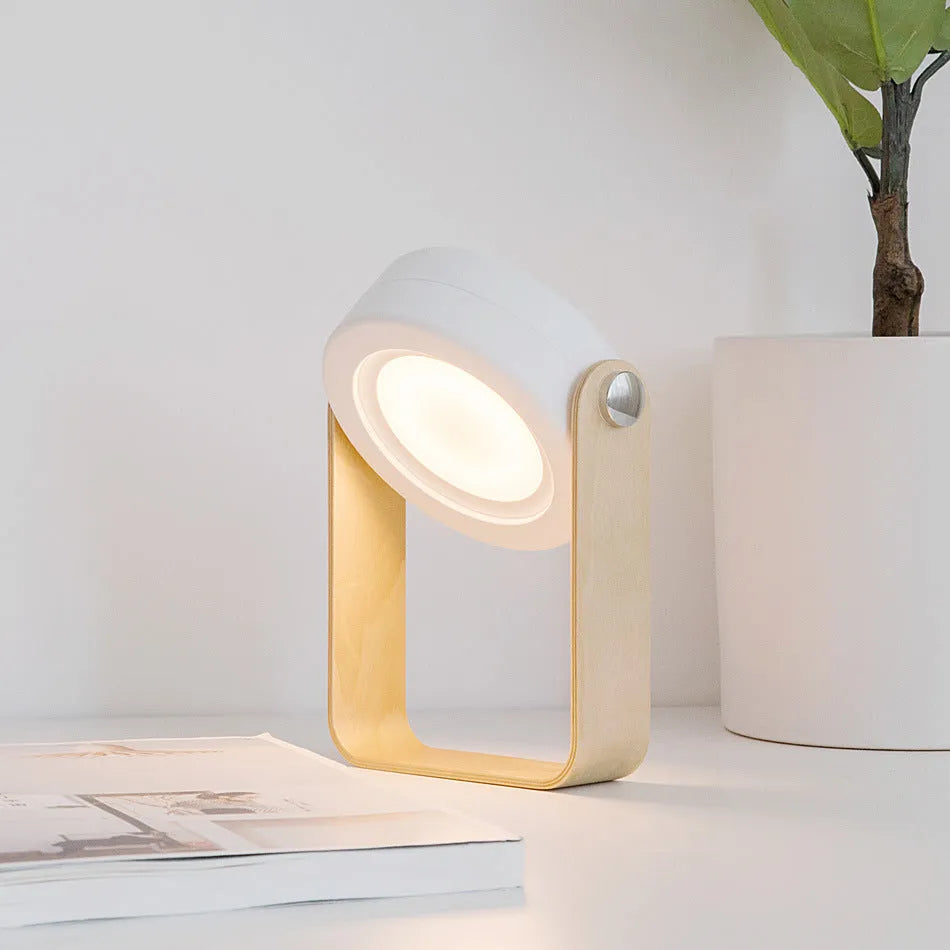 Foldable touch dimmable LED night light in white, showing both table lamp and expanded lantern modes.
