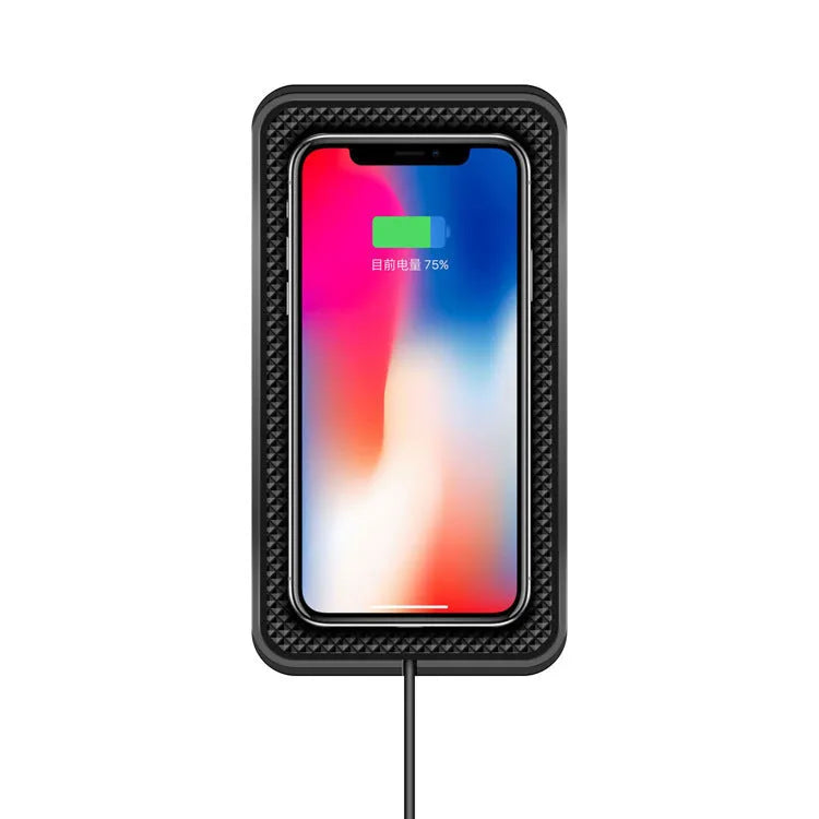 Black universal wireless car charger mount on a car air vent, charging a smartphone.