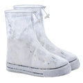 Waterproof shoe covers for men and women in PVC with non-slip sole, available in camouflage blue and transparent dot colours