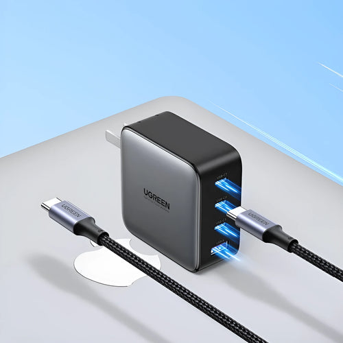 Compact 100W gallium nitride fast charger with Type-C port and included cable on a white background.