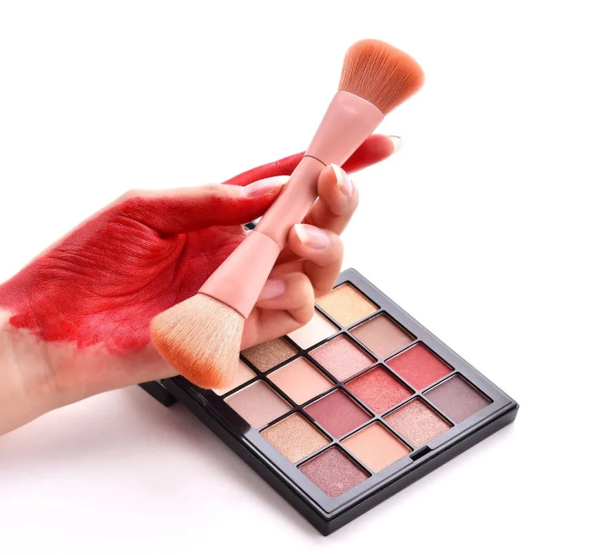 10-piece wooden handle makeup brush set including powder, foundation, eyeshadow, concealer, and lip brushes on pink background