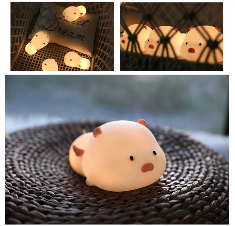 Blue silicone pig night light with sleeping expression and rechargeable battery