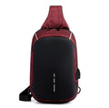 Dark blue Oxford cloth chest bag with adjustable strap, shown open to reveal internal mobile phone pocket.
