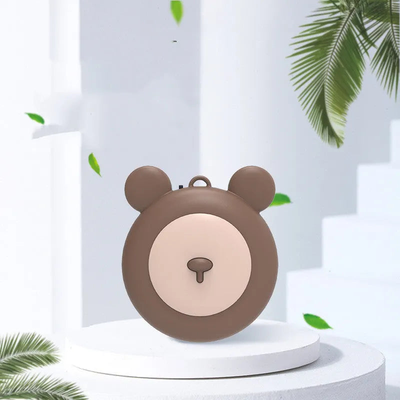 Portable necklace air purifier with sterilisation function in blue colour on a desk
