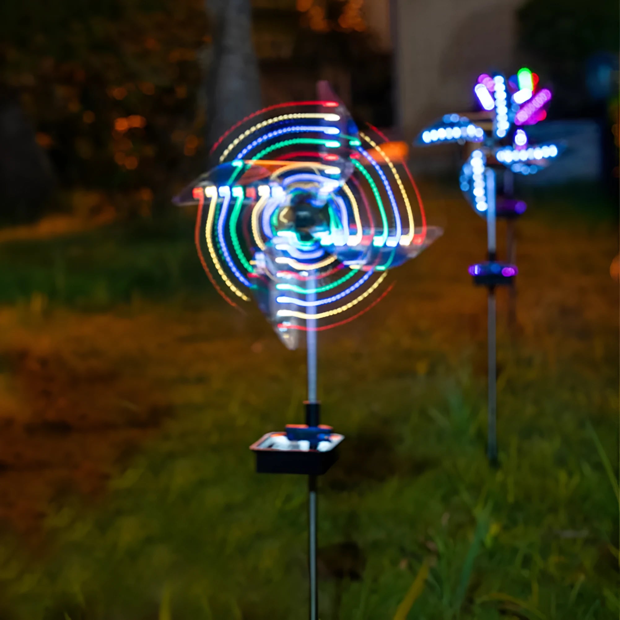 Solar wind spinner light with LED and IP65 rating, featuring spinning windmill decoration for garden paths in four colour options