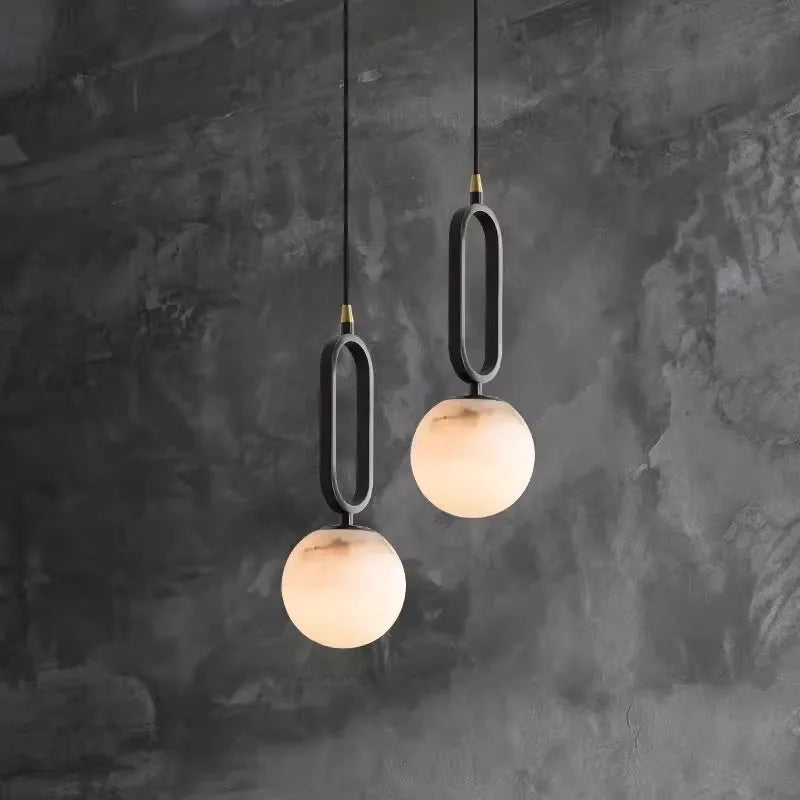 Nordic creative wall light bulb with marble shade and copper frame in black finish, 15cm diameter