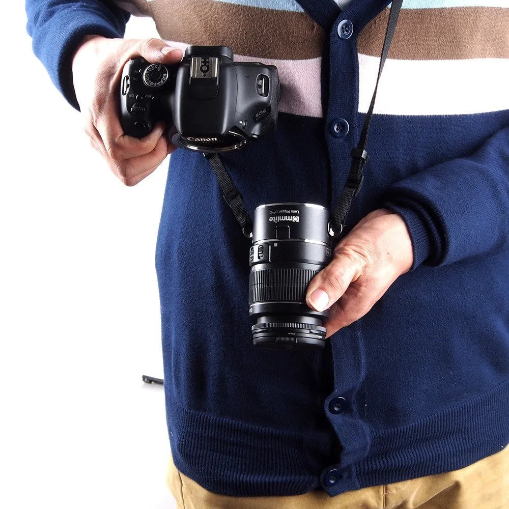Aluminium alloy Nikon E-Mount camera lens flipper dual holder with cotton shoulder strap.
