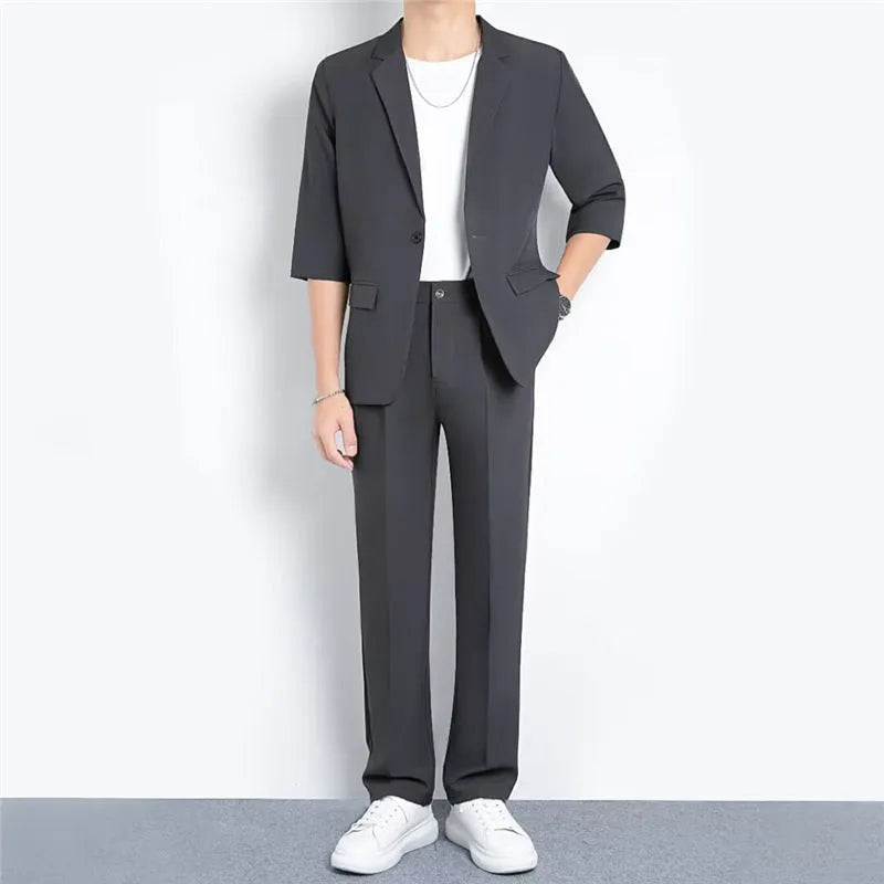 Light business summer suit with half sleeve jacket and trousers in thin cotton fabric