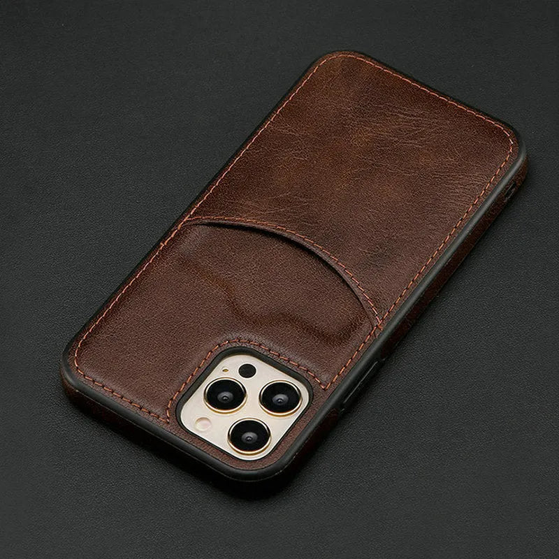 Dark blue PU leather protective case on an iPhone, showing a snug fit and raised edges around the screen.