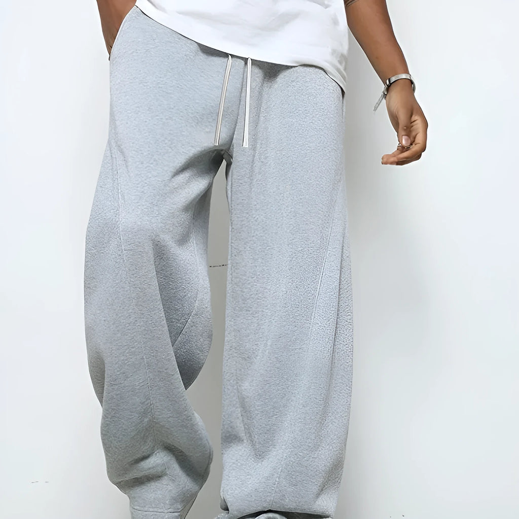 Men's straight-leg casual trousers in black with a micro-elastic waistband and drawstring