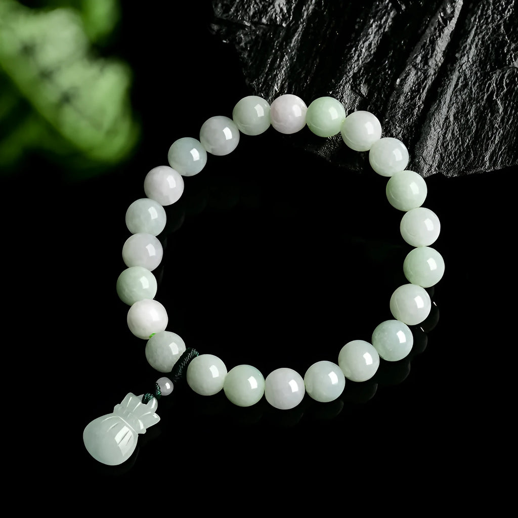 Jade stone bracelet with 8mm flower carving in unisex design for men and women