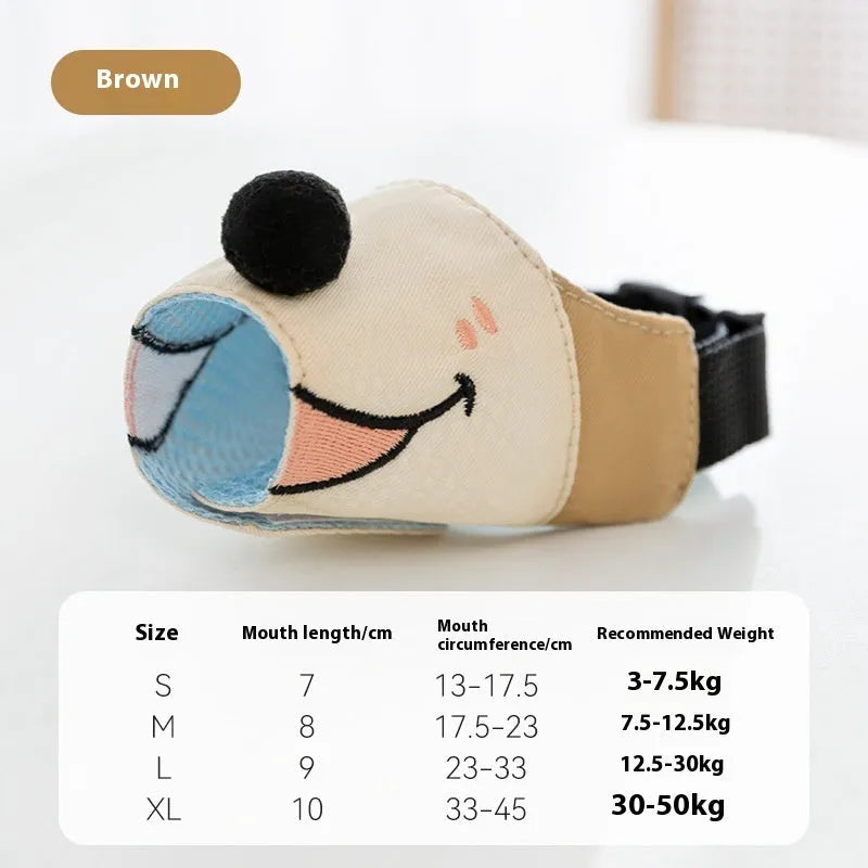 Adjustable canvas dog muzzle in Ollie Brown Bear design on a dog, showing three-strap fit.