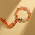 Jinsi jade agate Tibetan bracelet with lily flower and geometric bead designs