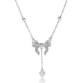 S925 sterling silver necklace with heart and bow pendant on an adjustable O-ring chain.