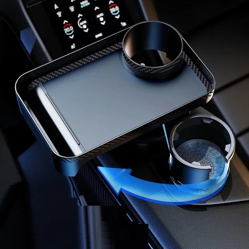 A black ABS plastic car-mounted rotating dinner tray holder inserted into a vehicle cup holder.