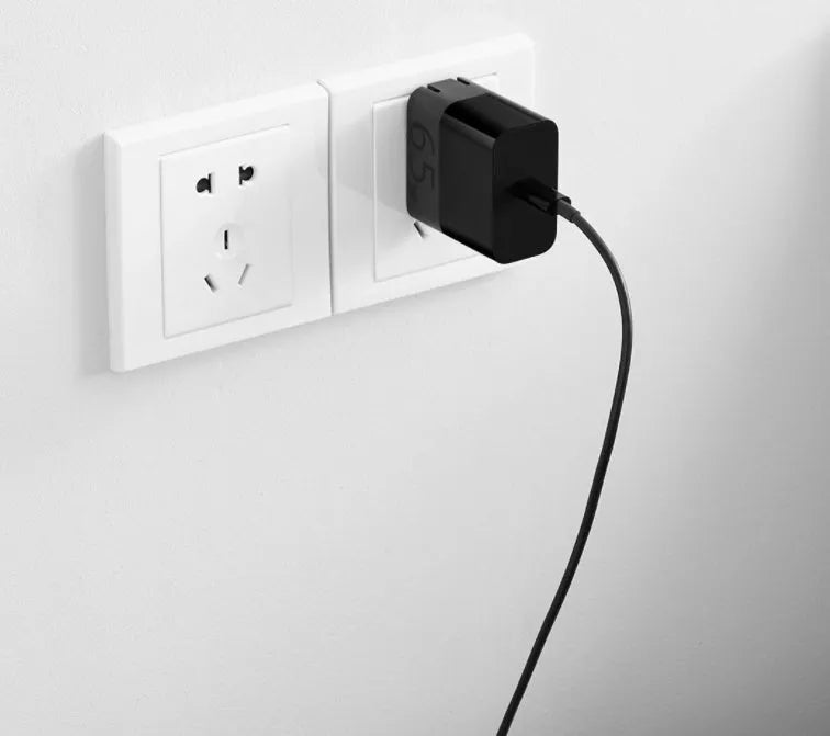 Black ZMI USB-C 65W notebook power adapter with compact design