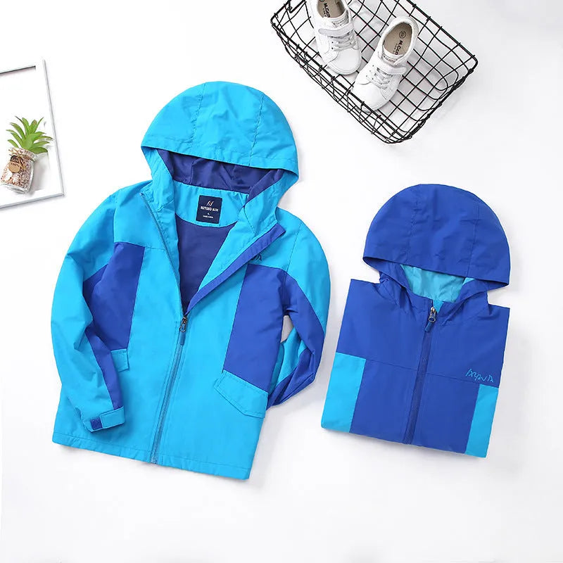 Boys' blue sanded acetate fibre autumn jacket with long sleeves and front zip.