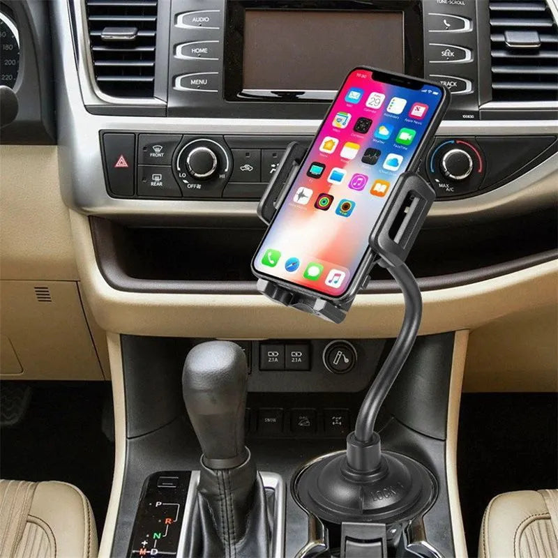 Black universal car phone mount bracket with adjustable side handles shown mounted on a car vent