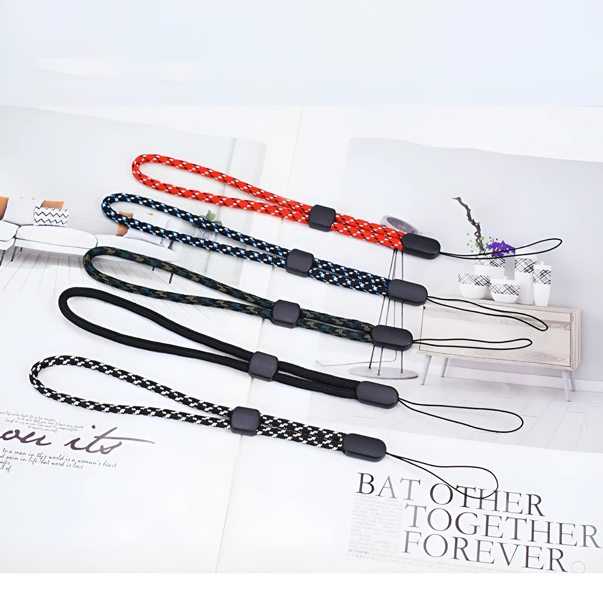Woven nylon mobile phone lanyard wrist strap in pure black, 20cm length, unisex design