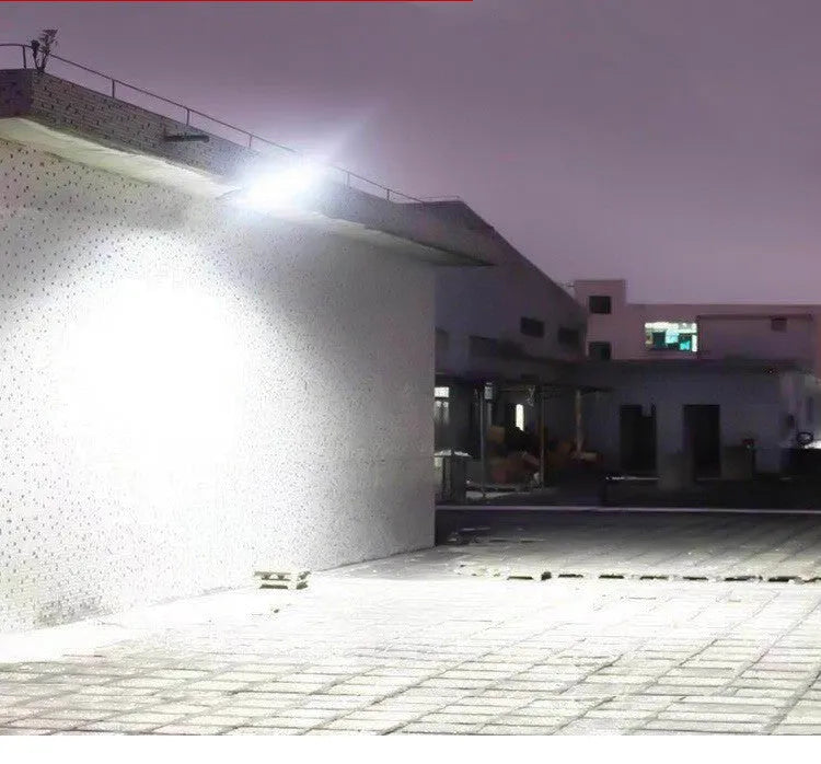 Black outdoor solar motion sensor light with solar panel and IP65 weatherproof rating
