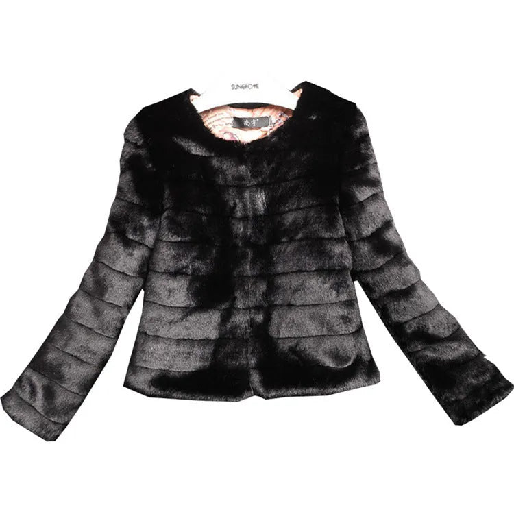 Women's short-length faux fur top in beige, shown with regular sleeves, on a model.