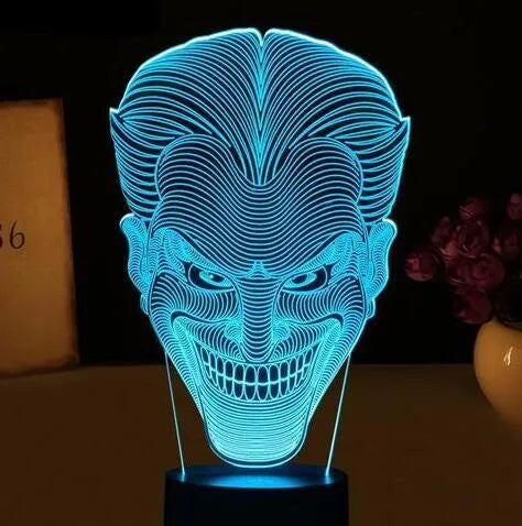 USB-powered 3D acrylic LED table lamp showing colourful gradient lighting on a desk.