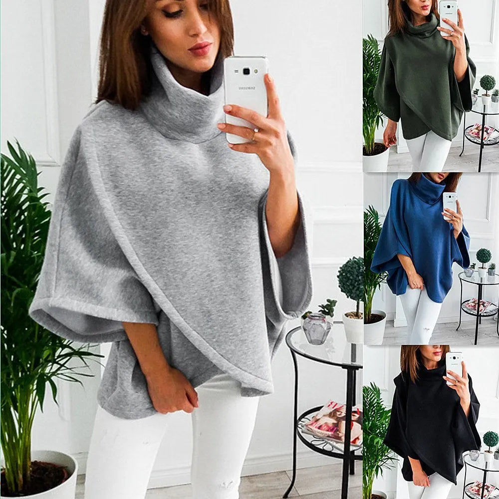 Long black women's cardigan with bat sleeves and a layered fake two-piece design.