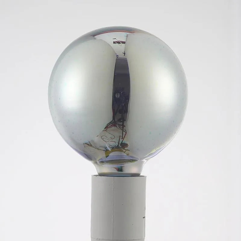 LED decorative light bulb with 3D firework projection effect and E27 screw base.