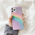 A gradient rainbow coloured TPU protective iPhone case with a striped design on a white background.