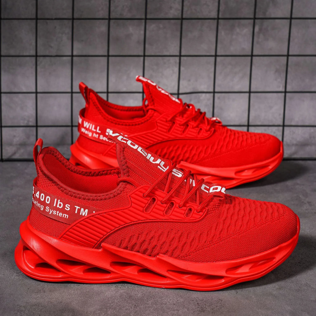 Women's casual FlyKnit shoe in a solid colour, showing mesh upper, round toe, and flat heel.
