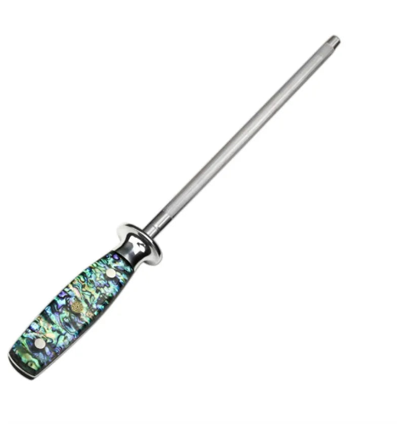 Manual high carbon steel knife sharpener with abalone shell handle on a surface
