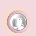 Baby bedside sleep lamp with projection feature showing orange, white and pink colour options