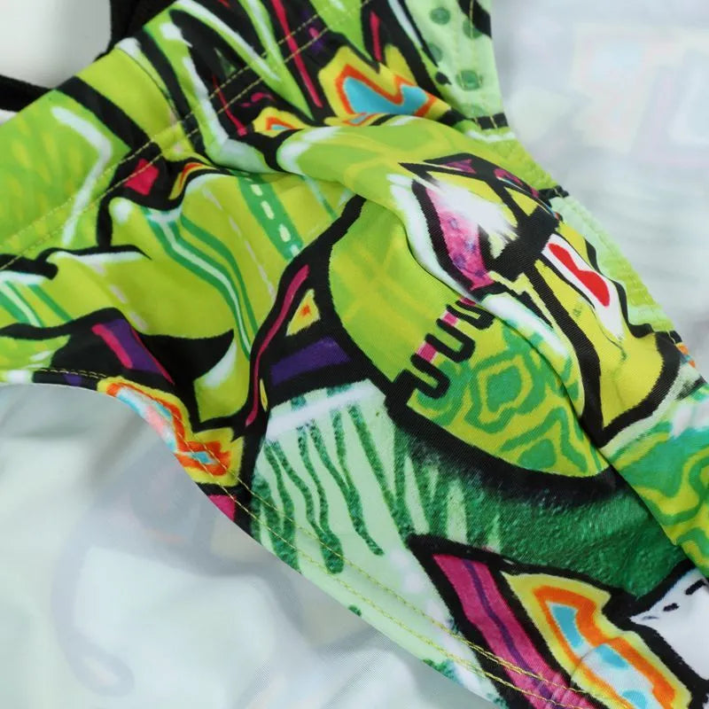 Men's printed swimming trunks in polyester fabric showing cyber, ice cream, streamer and skull pattern options