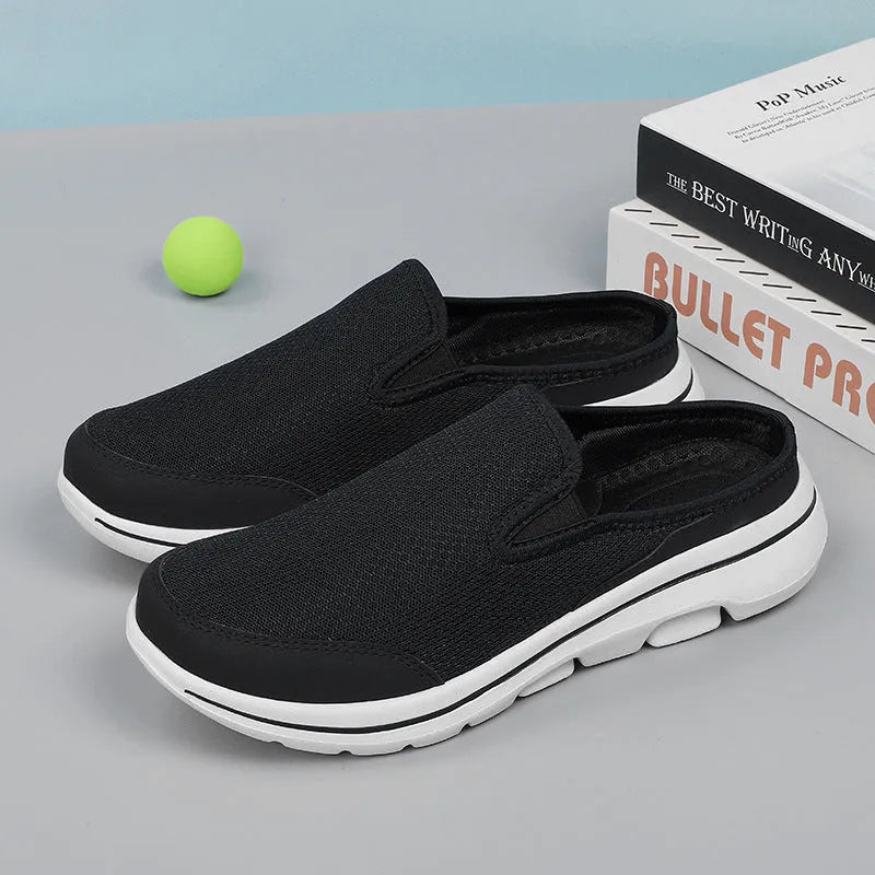 Breathable mesh toe holder slippers in solid colours on a flat heel sole.