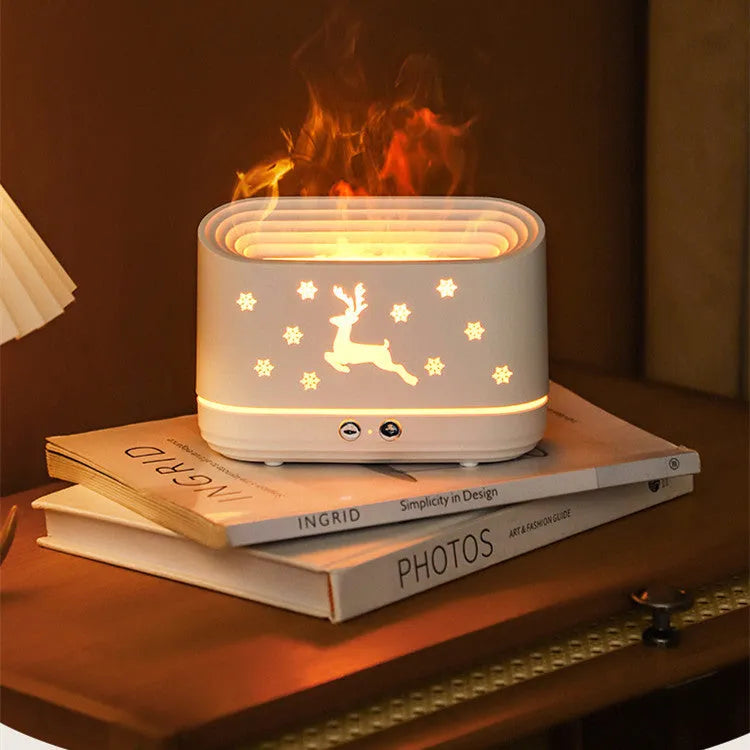 White round Elk flame effect humidifier diffuser with night light on a table.
