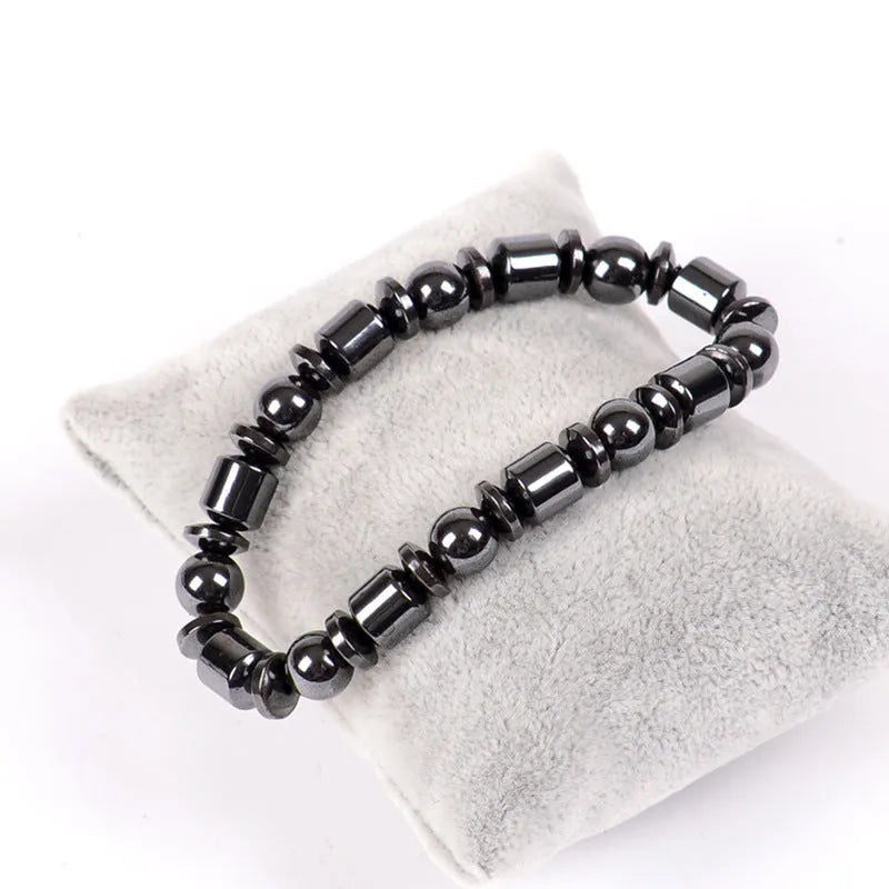 Black stretch magnetic therapy bracelet with pentagram magnetite and hematite stones for women and men