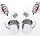 Silver electric milk frother handheld whisk with double stainless steel head on white background