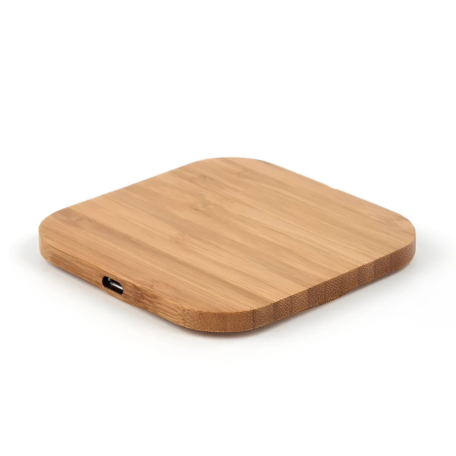 Square brown wooden bamboo 5W Qi wireless charging pad on a table