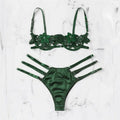Women's black half-cup unlined bra and brief lingerie set with adjustable straps