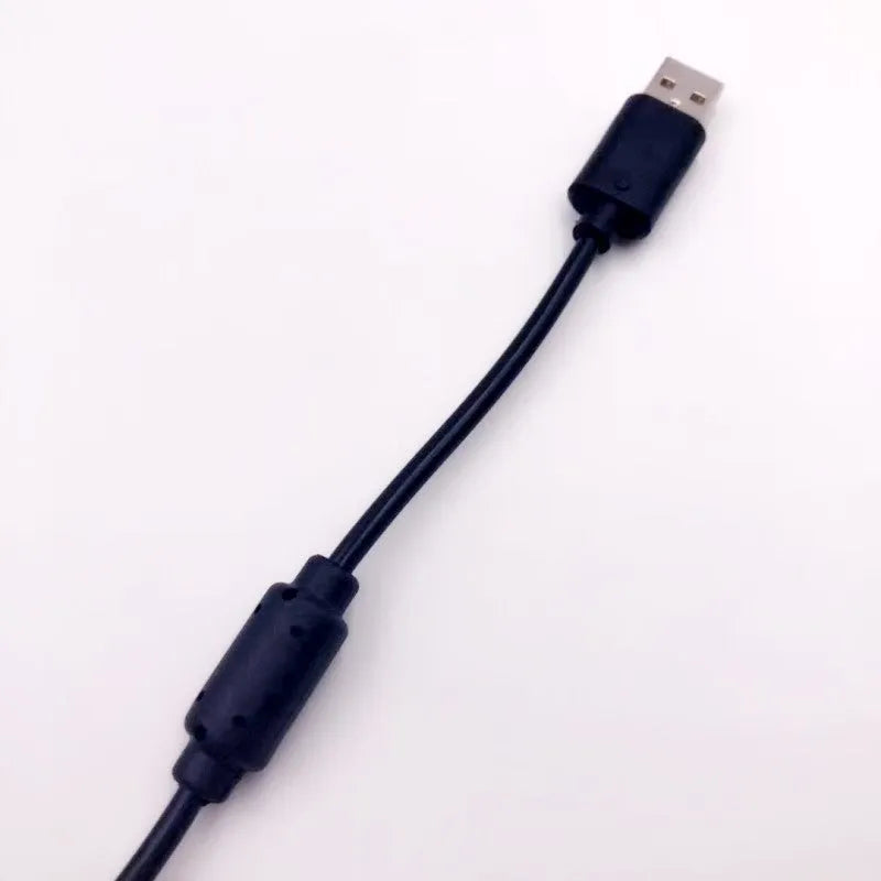 Black Xbox controller charging cable with magnetic ring, 1.5m USB lead on a desk