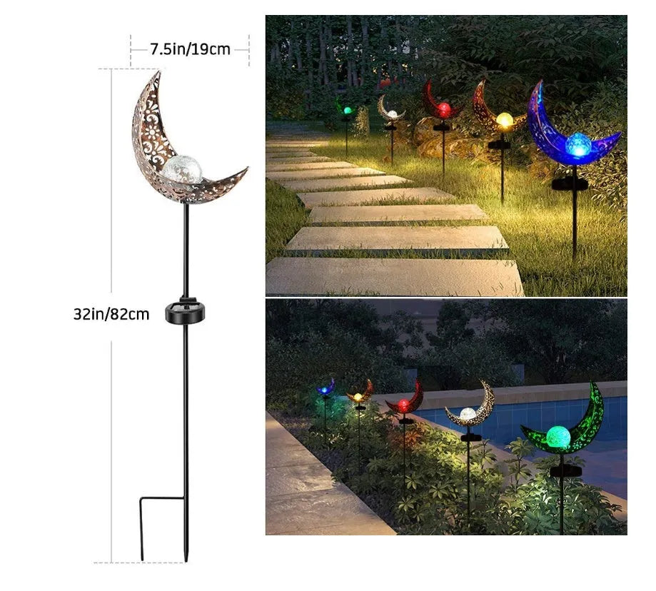 LED solar flame light with warm white glow, iron construction, and glass globe in an outdoor garden setting