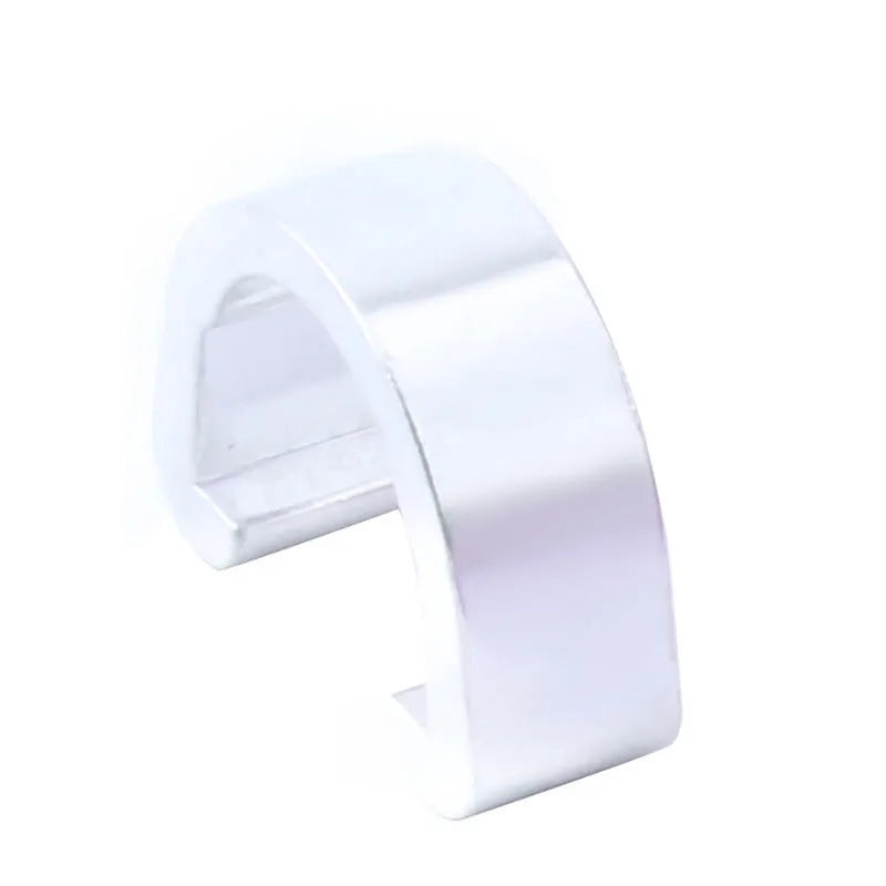 Ten small aluminium alloy C-shaped buckles in assorted colours on a white background.
