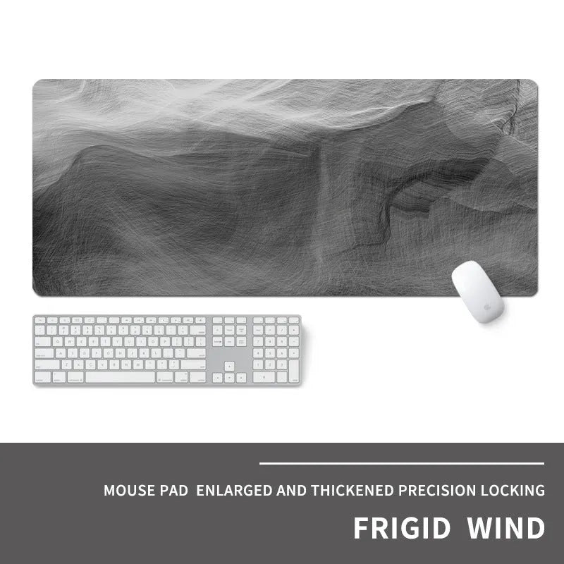 Oversized gaming mouse pad with graphic design on natural rubber base, showing keyboard and mouse placement.