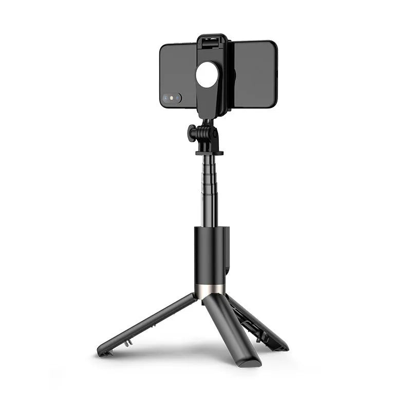 Aluminium alloy folding selfie stick stand with Bluetooth remote and detachable fill lights on a desktop