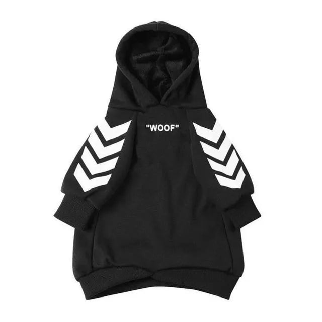 Winter dog jacket with hood, casual pet coat in black, side view on a dog