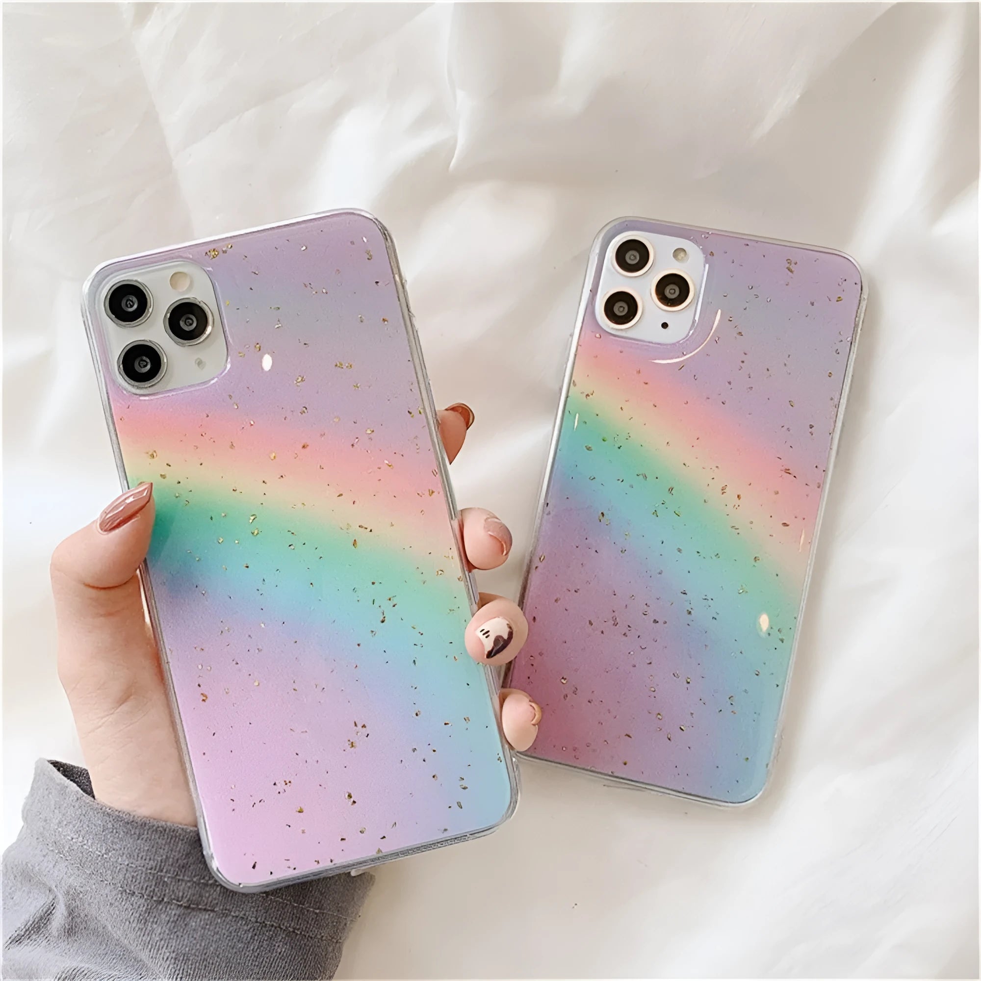 A gradient rainbow coloured TPU protective iPhone case with a striped design on a white background.