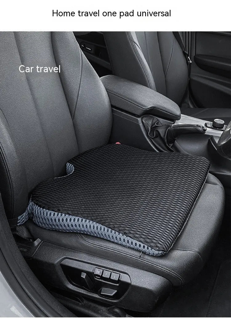 Memory foam lumbar cushion with straps on an office chair, shown in grey colour.