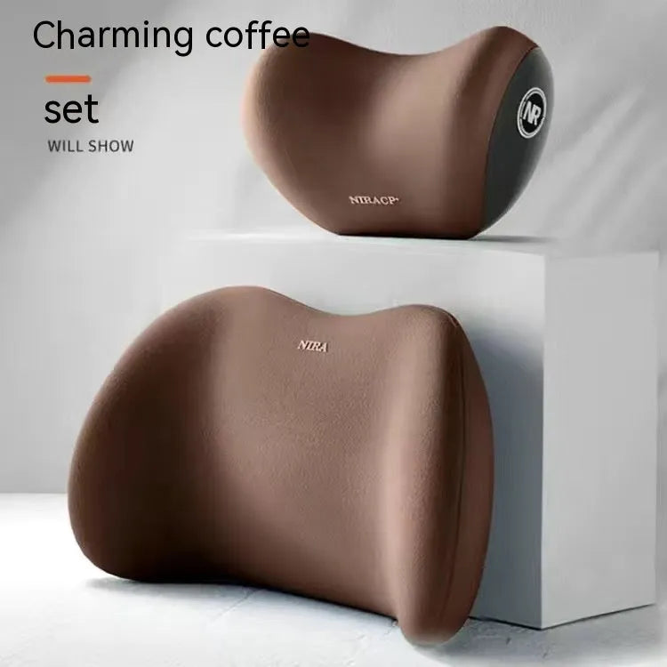 Black memory foam car headrest pillow and matching lumbar support pillow on a car seat.