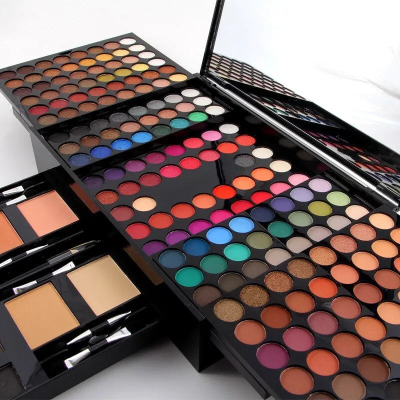 Piano-shaped makeup palette showing 180 colour eyeshadows, blushes, and powders in organised layout
